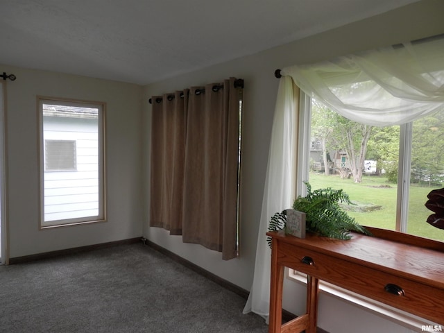 104 Henderson Rd, Knoxville, IL 61448 - carpeted empty room featuring baseboards