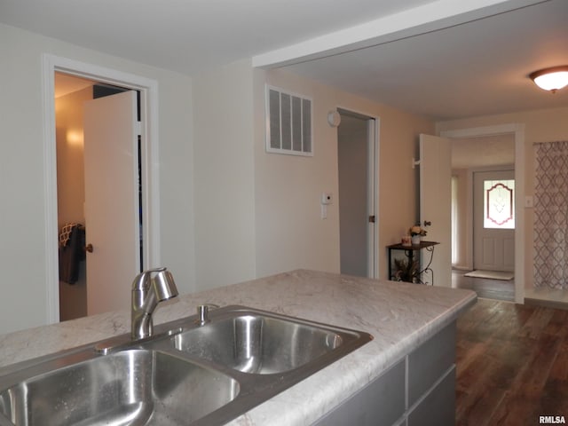 104 Henderson Rd, Knoxville, IL 61448 - kitchen featuring wood finished floors and light stone counters