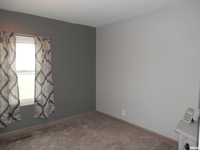 104 Henderson Rd, Knoxville, IL 61448 - carpeted empty room with baseboards