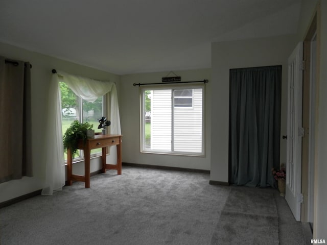 104 Henderson Rd, Knoxville, IL 61448 - carpeted empty room featuring healthy amount of natural light