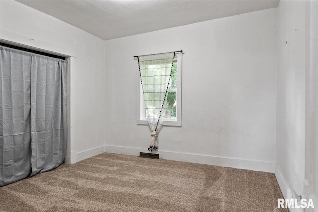402 Linkins Ave, Tovey, IL 62570 - carpeted empty room featuring baseboards