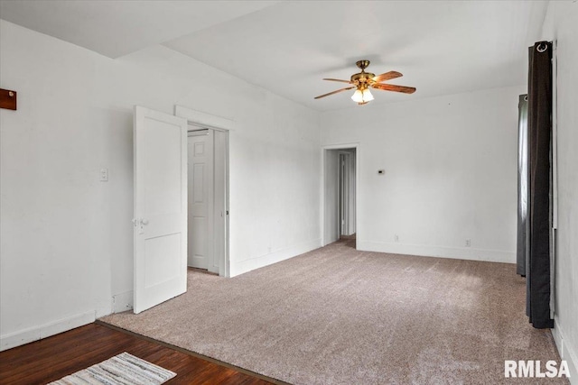 402 Linkins Ave, Tovey, IL 62570 - carpeted spare room with a ceiling fan and wood finished floors