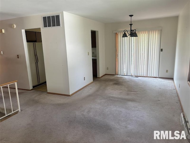 31 Glenwood Ln, Chatham, IL 62629 - empty room featuring carpet flooring and a chandelier