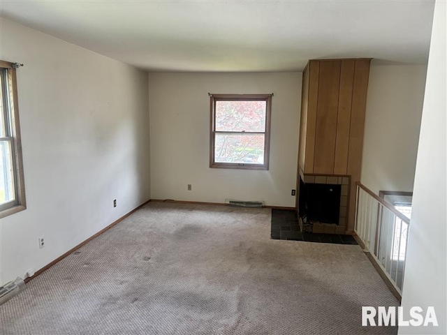 31 Glenwood Ln, Chatham, IL 62629 - unfurnished living room featuring carpet floors