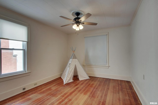 2204 Spring St, Quincy, IL 62301 - unfurnished room featuring light wood-type flooring and a ceiling fan