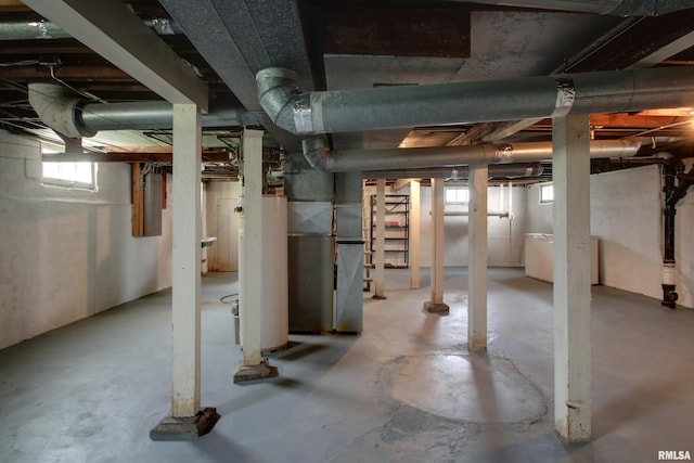 2204 Spring St, Quincy, IL 62301 - below grade area featuring water heater and electric panel