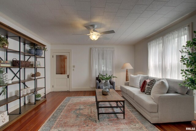 2204 Spring St, Quincy, IL 62301 - living area featuring a ceiling fan and wood finished floors