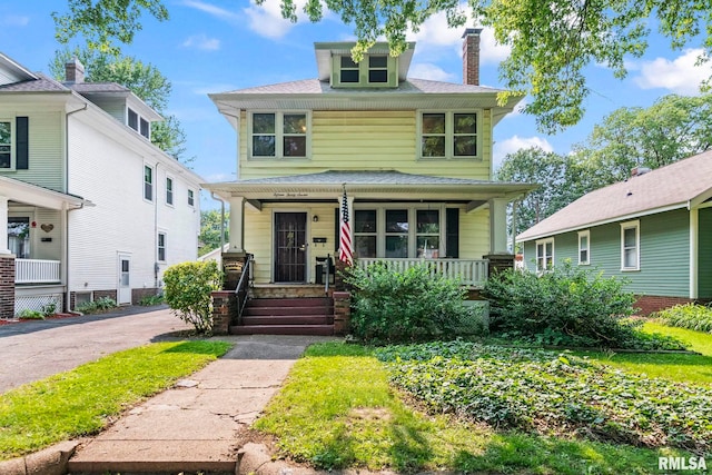 1537 N 4th St, Springfield, IL 62702 - traditional style home featuring covered porch, a chimney, and roof with shingles