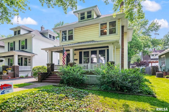 1537 N 4th St, Springfield, IL 62702 - traditional style home featuring covered porch and a front yard