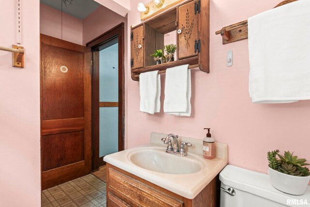 1537 N 4th St, Springfield, IL 62702 - bathroom with vanity and tile patterned floors