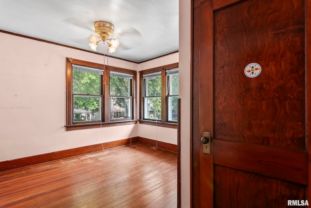 1537 N 4th St, Springfield, IL 62702 - foyer featuring hardwood / wood-style floors, ceiling fan, and ornamental molding