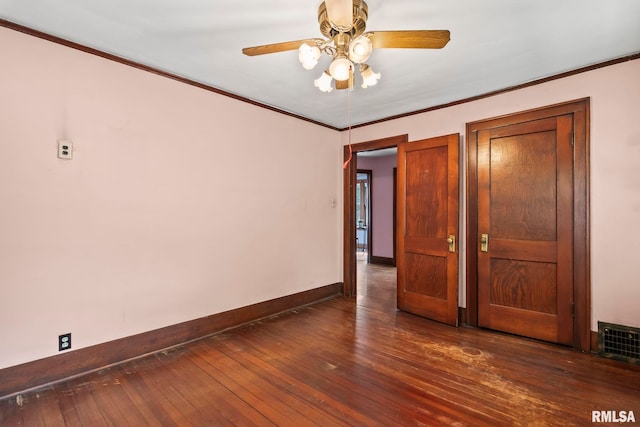 1537 N 4th St, Springfield, IL 62702 - unfurnished room featuring a ceiling fan, dark wood-type flooring, and ornamental molding
