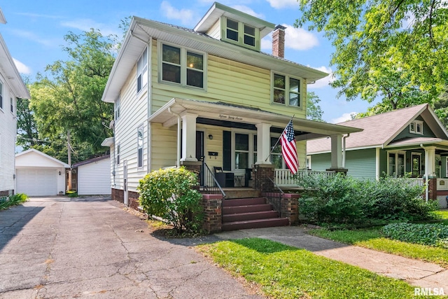 1537 N 4th St, Springfield, IL 62702 - traditional style home with covered porch, an outbuilding, a detached garage, and a chimney