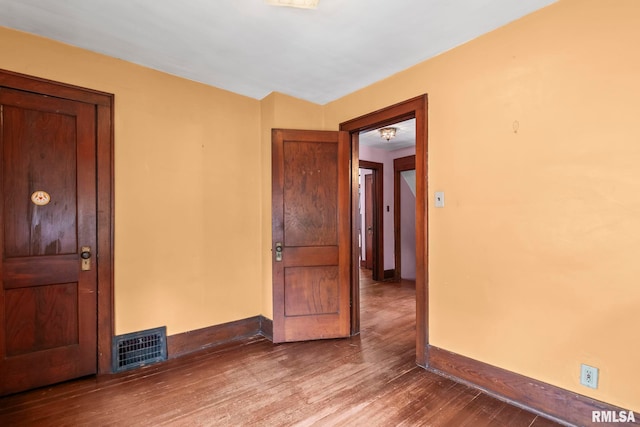 1537 N 4th St, Springfield, IL 62702 - spare room with baseboards and wood finished floors
