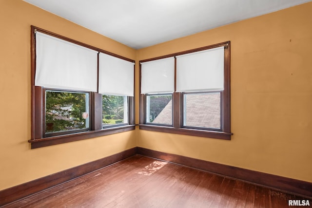 1537 N 4th St, Springfield, IL 62702 - spare room featuring hardwood / wood-style floors and baseboards