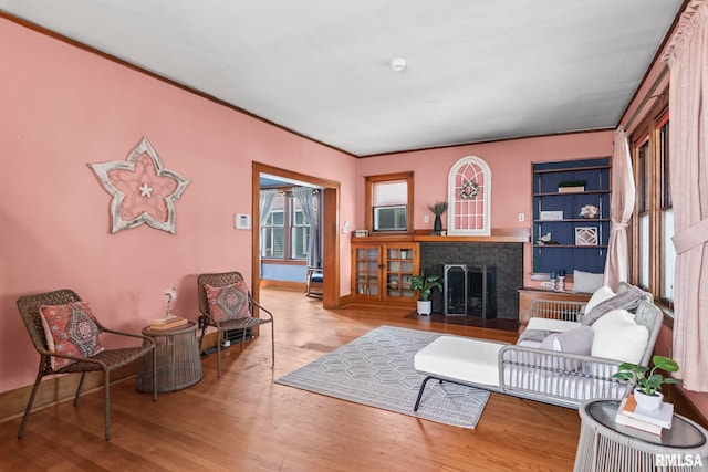 1537 N 4th St, Springfield, IL 62702 - living area featuring wood finished floors and a fireplace