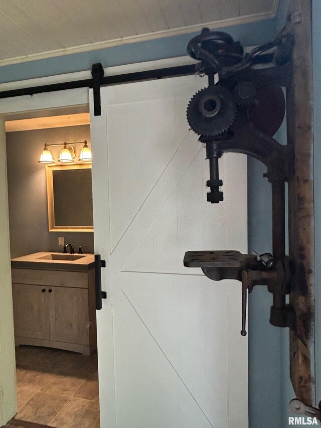 726 W N St, Auburn, IL 62629 - corridor with a barn door, dark wood finished floors, wooden ceiling, and crown molding