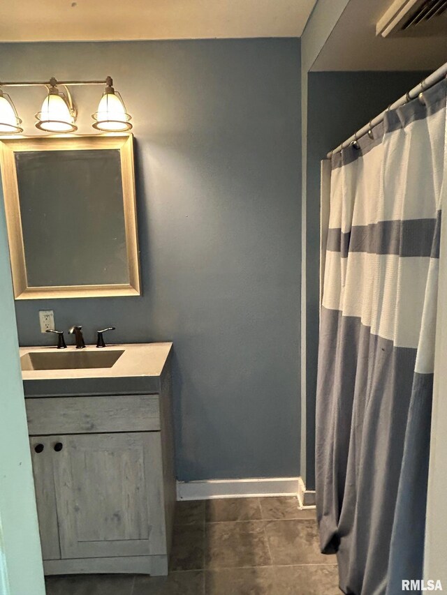 726 W N St, Auburn, IL 62629 - bathroom with vanity and tile patterned flooring