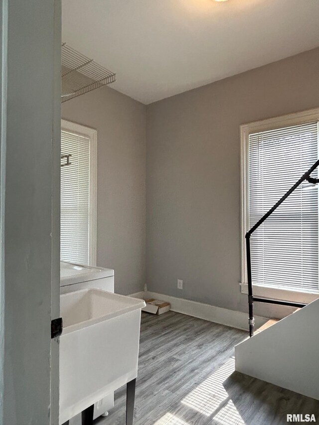 726 W N St, Auburn, IL 62629 - interior space featuring wood finished floors and a sink