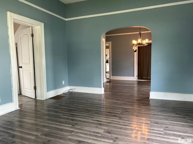 726 W N St, Auburn, IL 62629 - empty room featuring plenty of natural light and dark wood-style flooring