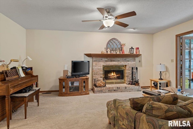 5309 Collins Way, Springfield, IL 62703 - living area with light carpet, a fireplace, a textured ceiling, and ceiling fan