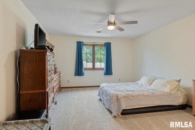 5309 Collins Way, Springfield, IL 62703 - bedroom featuring light carpet, a textured ceiling, and a ceiling fan
