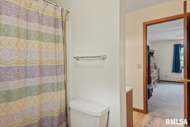 5309 Collins Way, Springfield, IL 62703 - bathroom featuring wood finished floors and curtained shower
