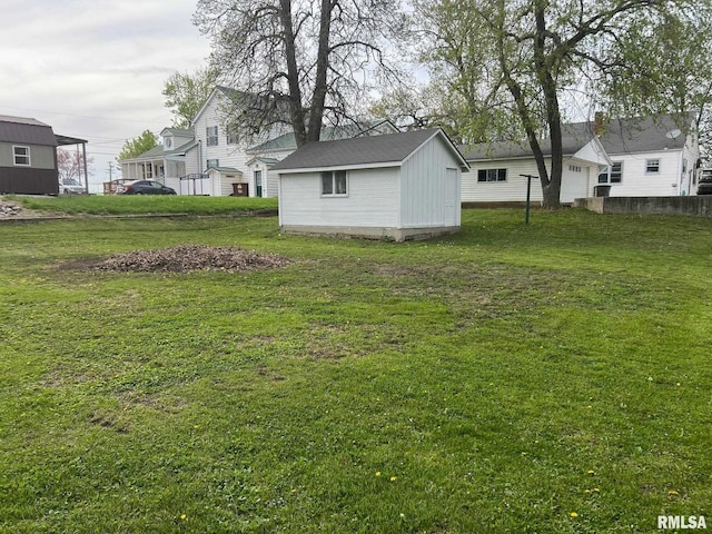 805 W Washington St, Pittsfield, IL 62363 - view of grassy yard with a storage unit