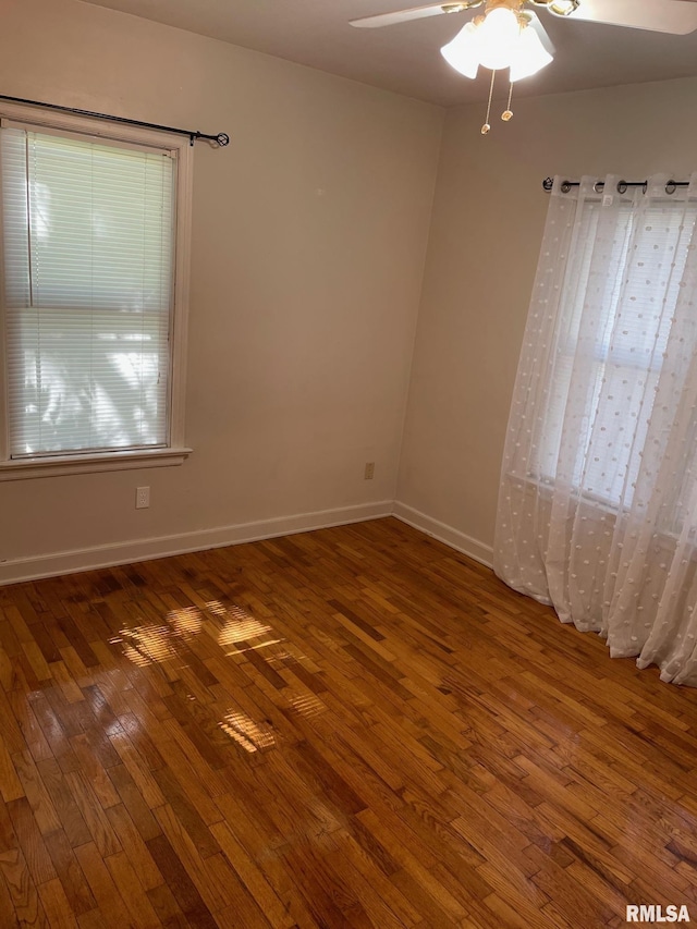 805 W Washington St, Pittsfield, IL 62363 - unfurnished room with hardwood / wood-style floors and a ceiling fan