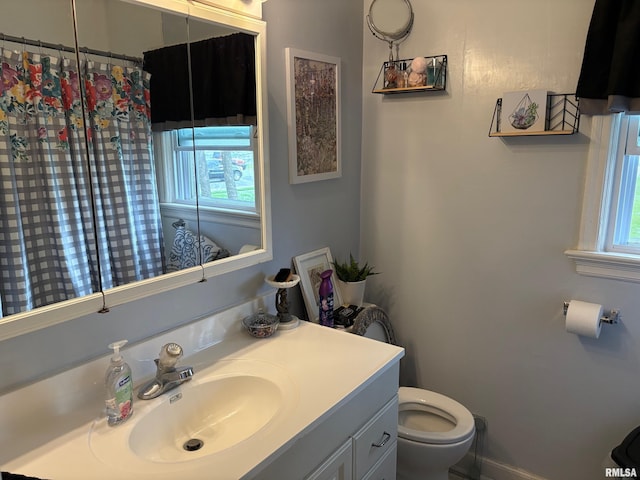 805 W Washington St, Pittsfield, IL 62363 - bathroom featuring toilet and vanity