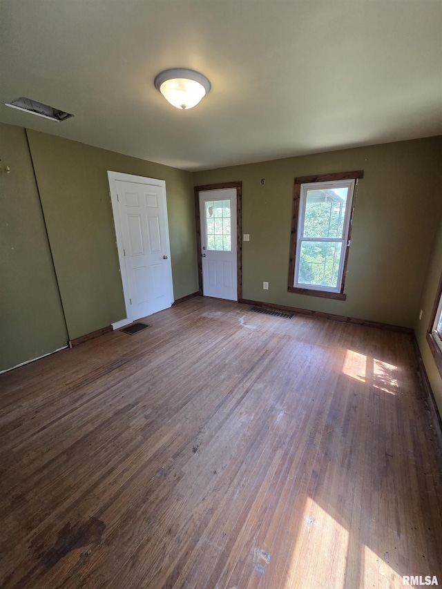 1355 Old Wagon Rd, Knoxville, IL 61448 - unfurnished room featuring wood finished floors and baseboards