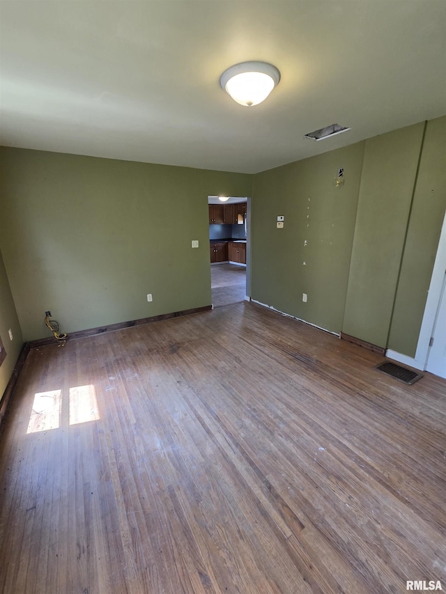 1355 Old Wagon Rd, Knoxville, IL 61448 - empty room with wood finished floors and baseboards