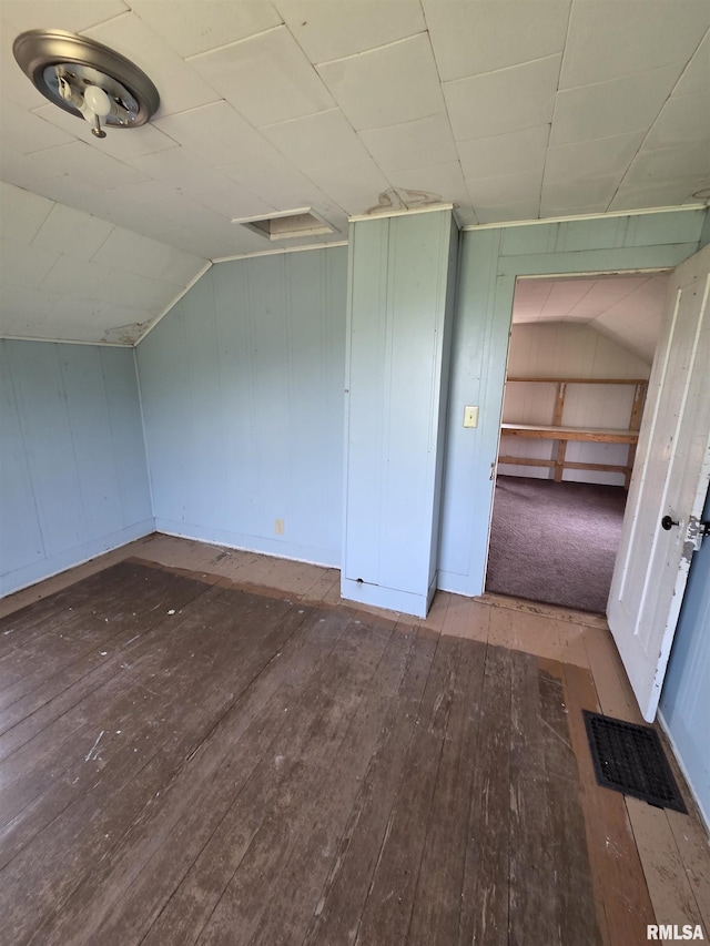 1355 Old Wagon Rd, Knoxville, IL 61448 - spare room with hardwood / wood-style flooring and lofted ceiling