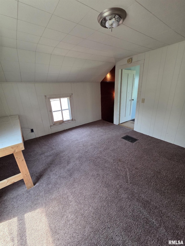 1355 Old Wagon Rd, Knoxville, IL 61448 - unfurnished living room with carpet and lofted ceiling
