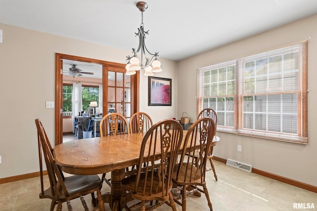 5313 Jaeger Dr, Springfield, IL 62711 - dining room with a chandelier and light tile patterned floors