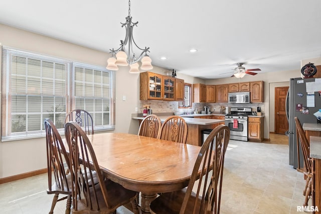 5313 Jaeger Dr, Springfield, IL 62711 - dining area featuring ceiling fan, recessed lighting, a chandelier, and light tile patterned floors