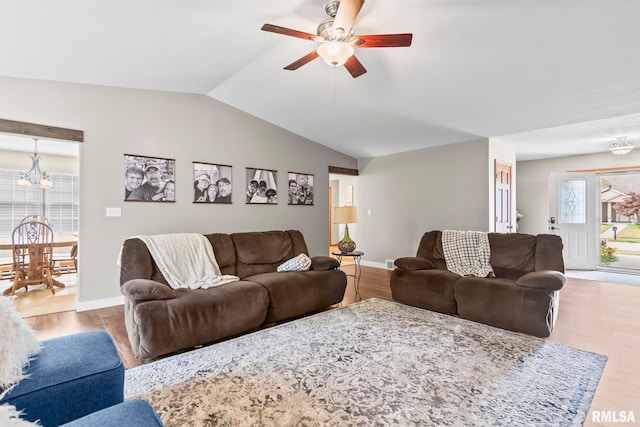 5313 Jaeger Dr, Springfield, IL 62711 - living room with a ceiling fan, vaulted ceiling, and wood finished floors