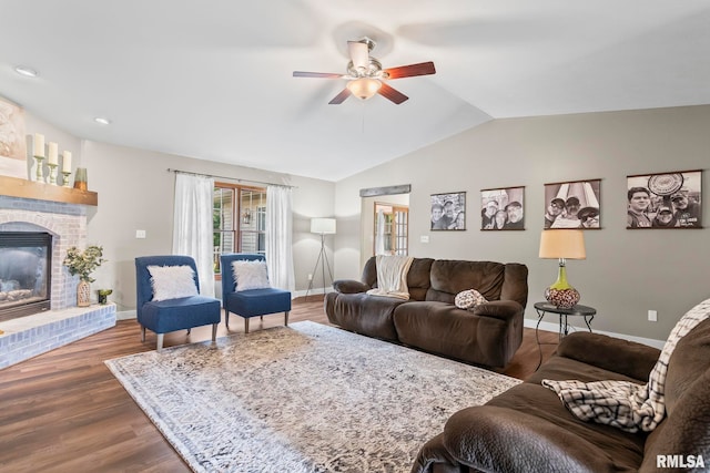 5313 Jaeger Dr, Springfield, IL 62711 - living room featuring ceiling fan, lofted ceiling, a brick fireplace, and wood finished floors