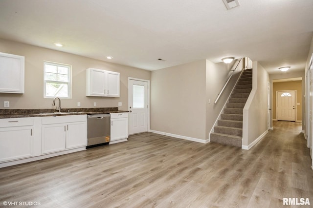 713 S Jackson St, Litchfield, IL 62056 - kitchen featuring stainless steel dishwasher, white cabinets, light wood-style flooring, plenty of natural light, and recessed lighting