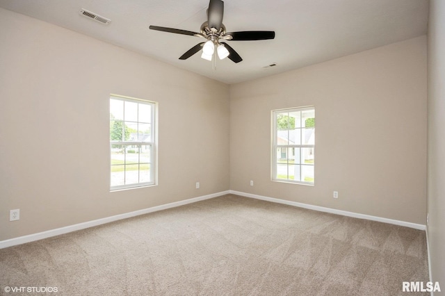 713 S Jackson St, Litchfield, IL 62056 - unfurnished room with carpet flooring and a ceiling fan
