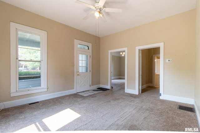 117 W Jefferson St, Macomb, IL 61455 - entrance foyer with carpet and ceiling fan