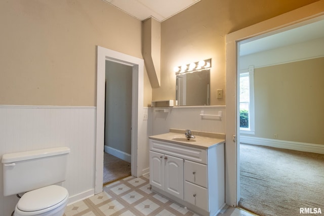 117 W Jefferson St, Macomb, IL 61455 - bathroom with vanity and a wainscoted wall