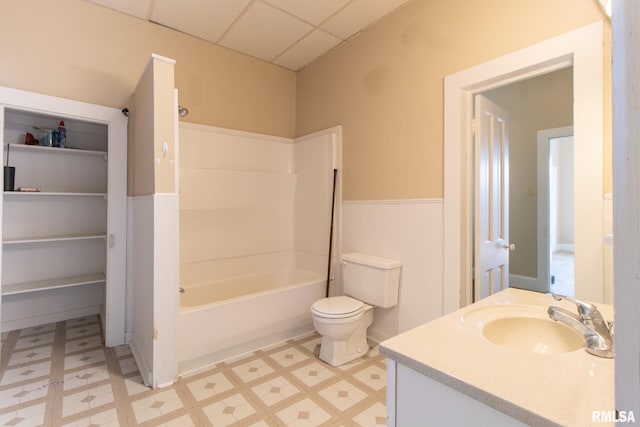 117 W Jefferson St, Macomb, IL 61455 - bathroom with vanity, tile patterned floors, a paneled ceiling, and shower / tub combination
