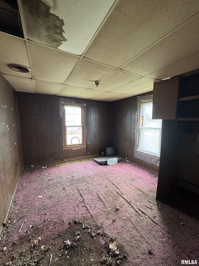 219 5th St, Lincoln, IL 62656 - unfurnished room with a paneled ceiling