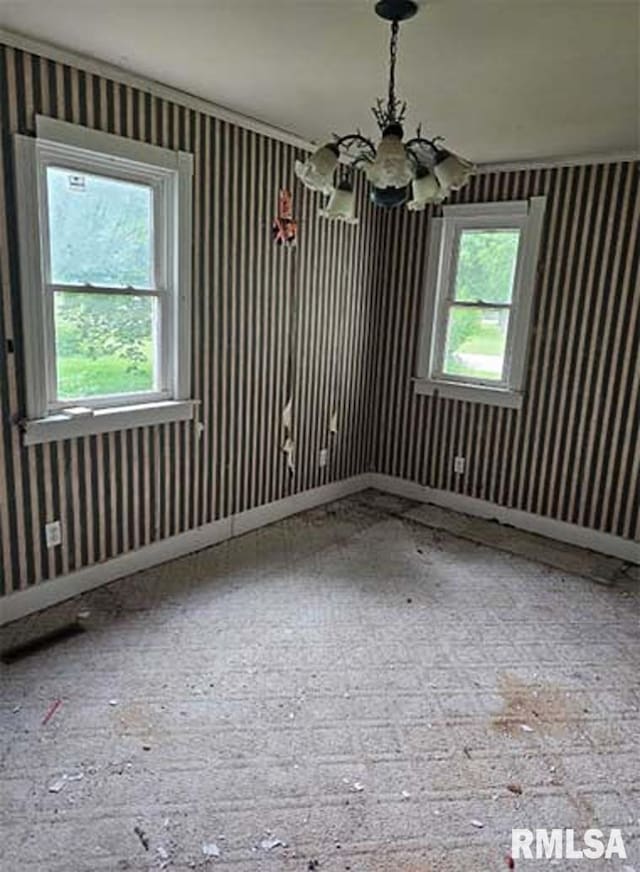 113 S Franklin St, Camp Point, IL 62320 - empty room with a chandelier