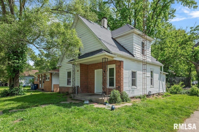 1230 S 13th St, Springfield, IL 62703 - view of front facade with a front lawn, a chimney, a porch, and roof with shingles