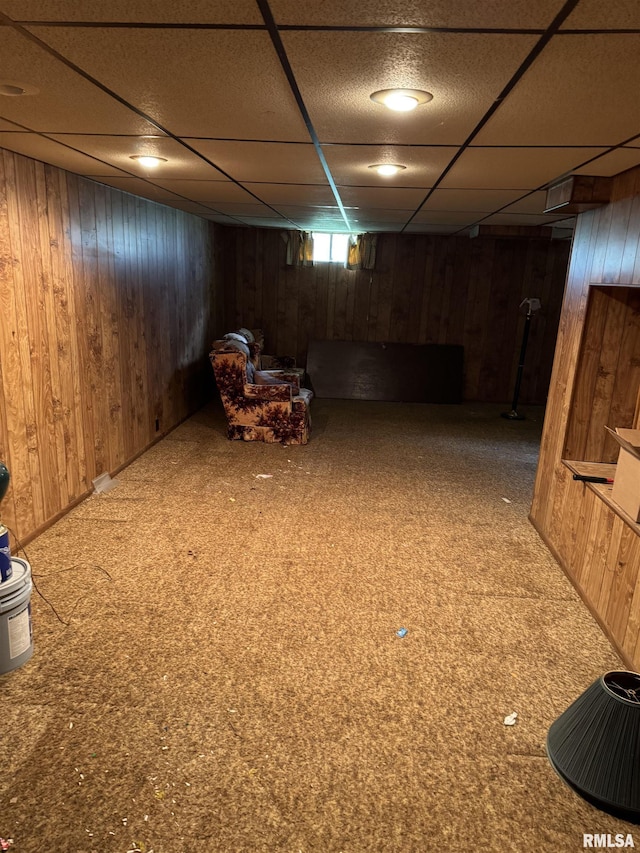 10333 Evergreen Dr, Manito, IL 61546 - basement with wooden walls and a drop ceiling