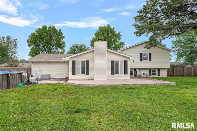 27 Twilight Ln, Springfield, IL 62712 - rear view of property featuring a patio and a chimney