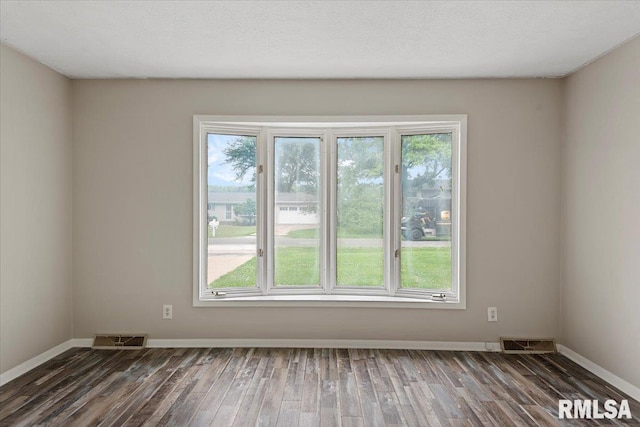 27 Twilight Ln, Springfield, IL 62712 - spare room featuring wood finished floors and plenty of natural light