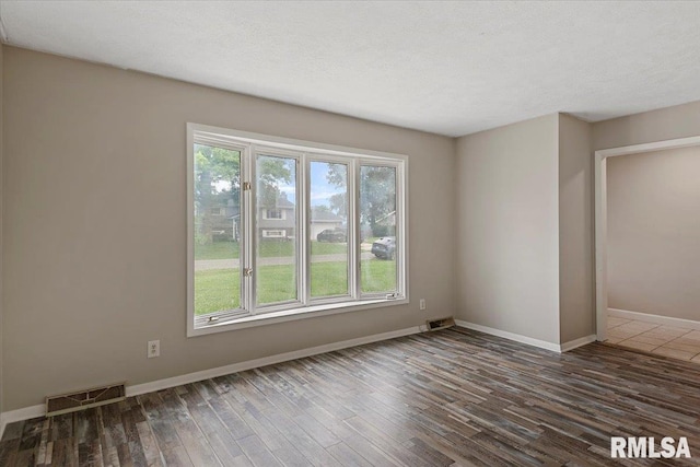 27 Twilight Ln, Springfield, IL 62712 - unfurnished room featuring hardwood / wood-style flooring and plenty of natural light